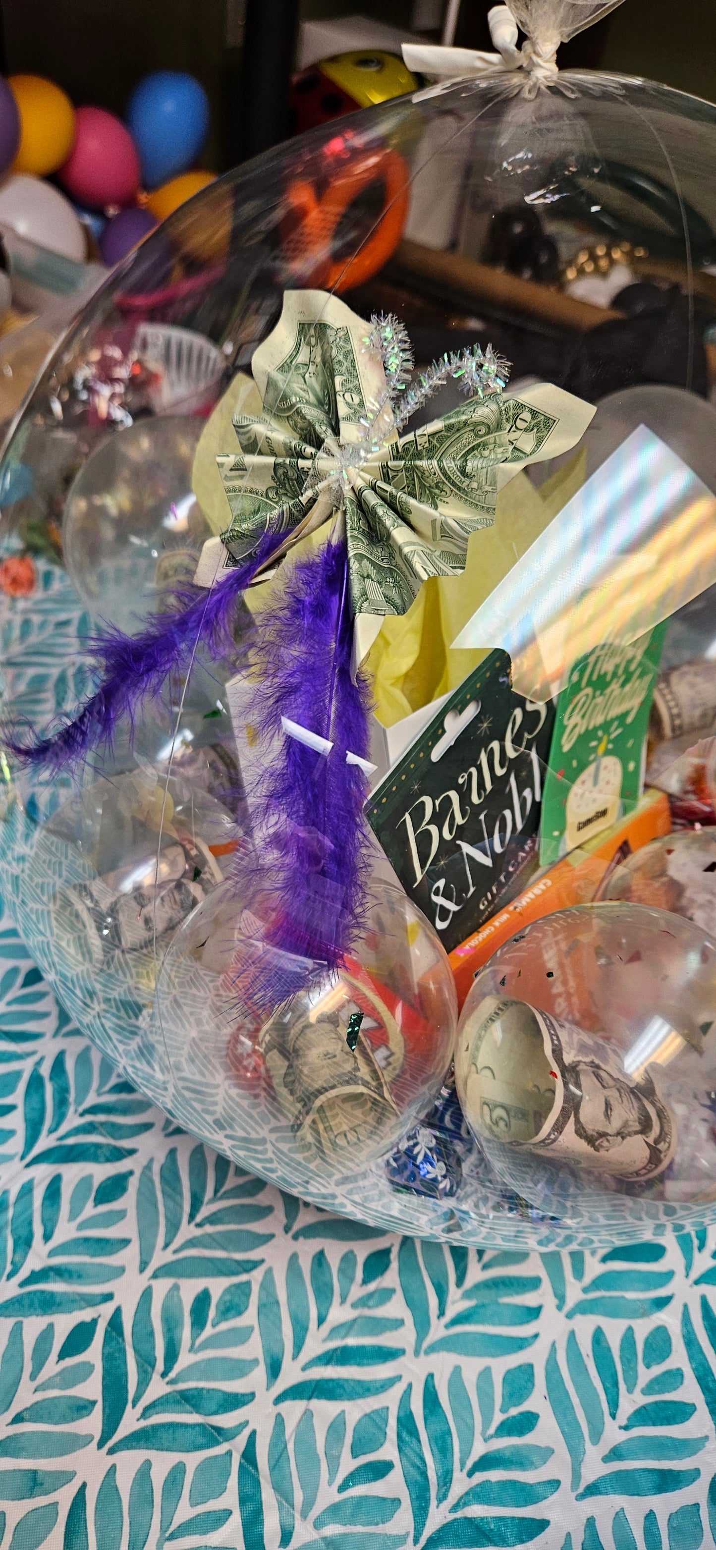 Add three origami butterflies made from currency bills to Balloon Box. Customer will provide currency.