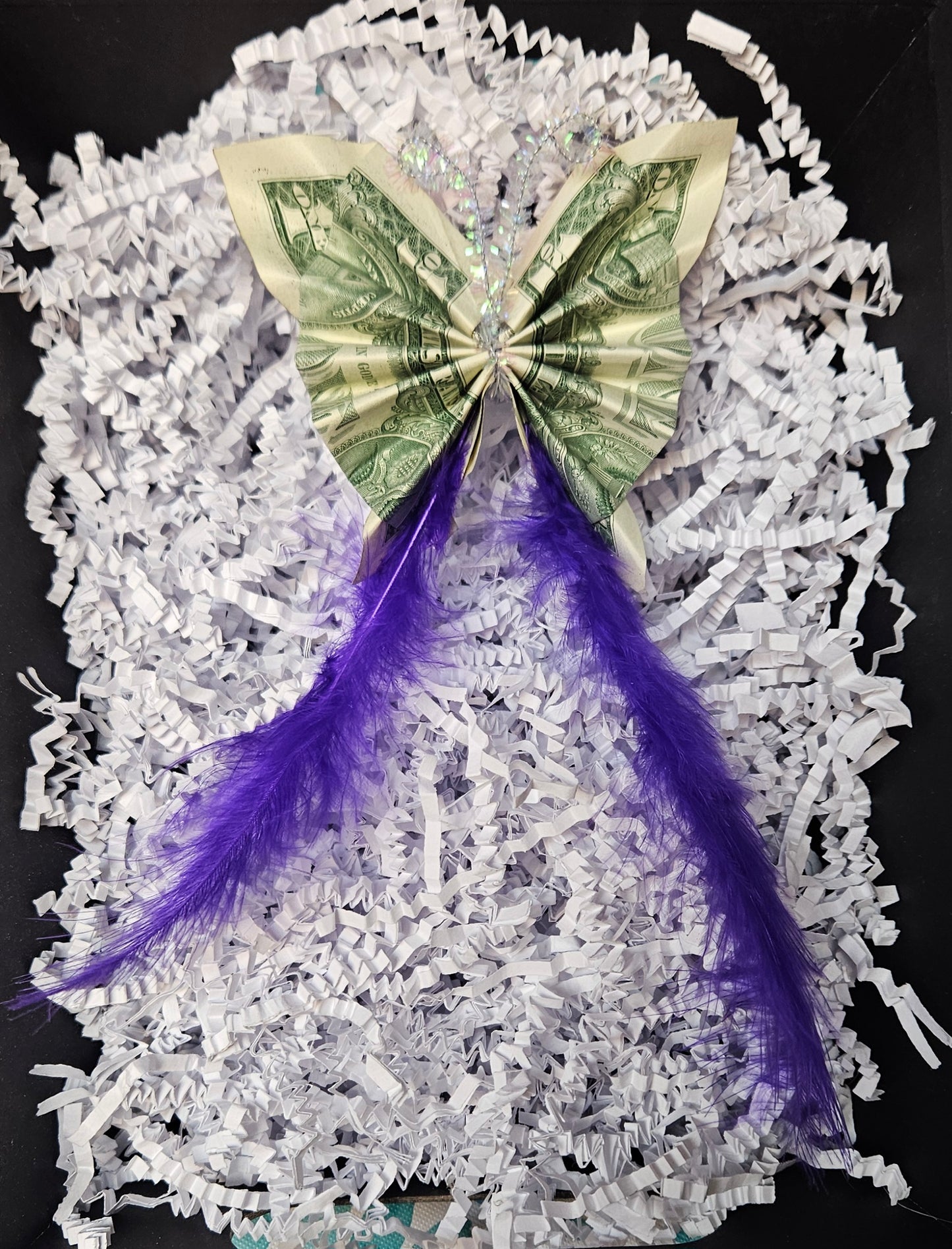 Add three origami butterflies made from currency bills to Balloon Box. Customer will provide currency.