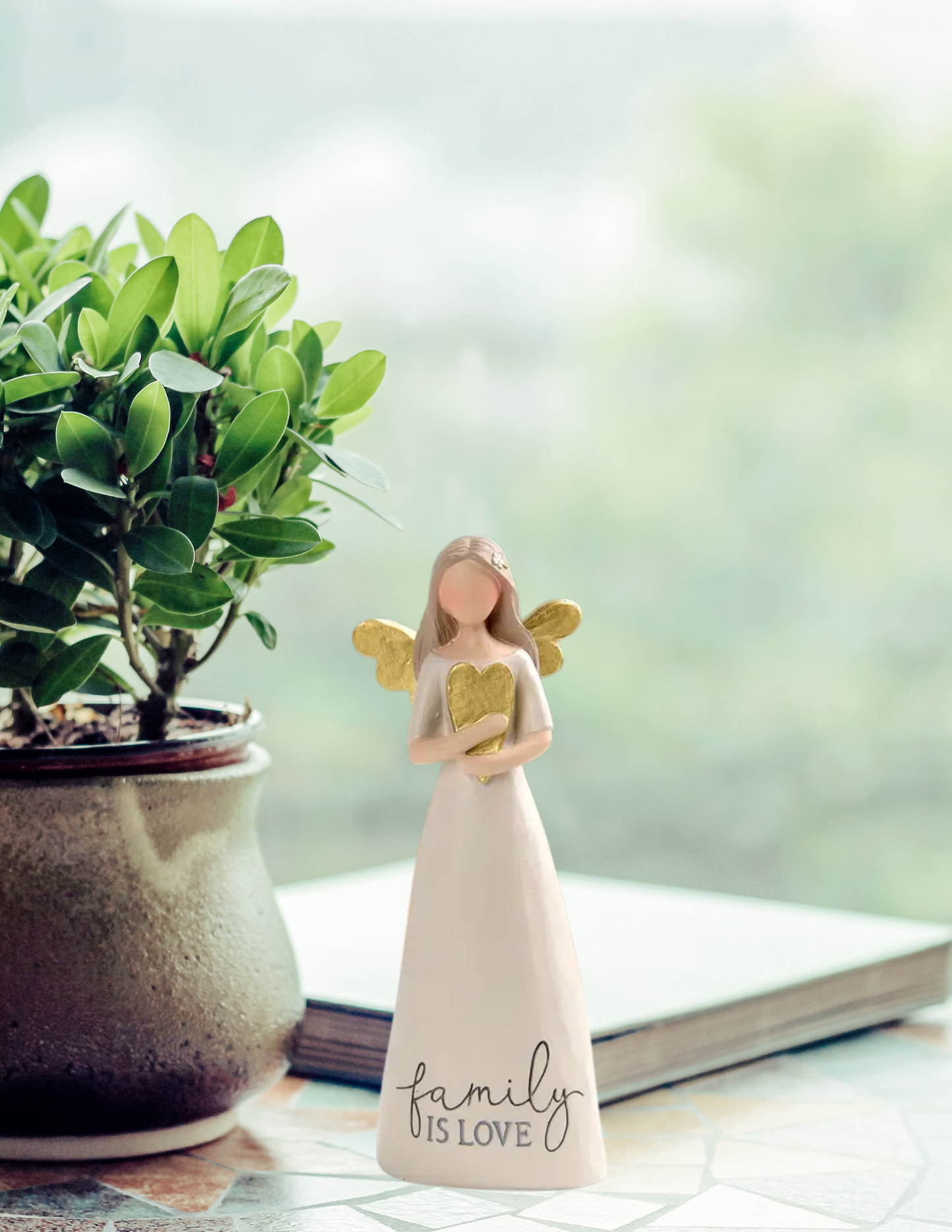 "Family Is Love" Angel Holding Gold Heart Figurine