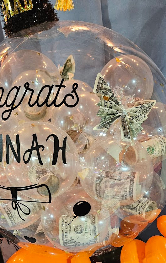 Add three origami butterflies made from currency bills to Balloon Box. Customer will provide currency.