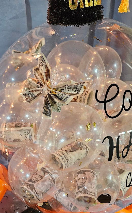 Add three origami butterflies made from currency bills to Balloon Box. Customer will provide currency.