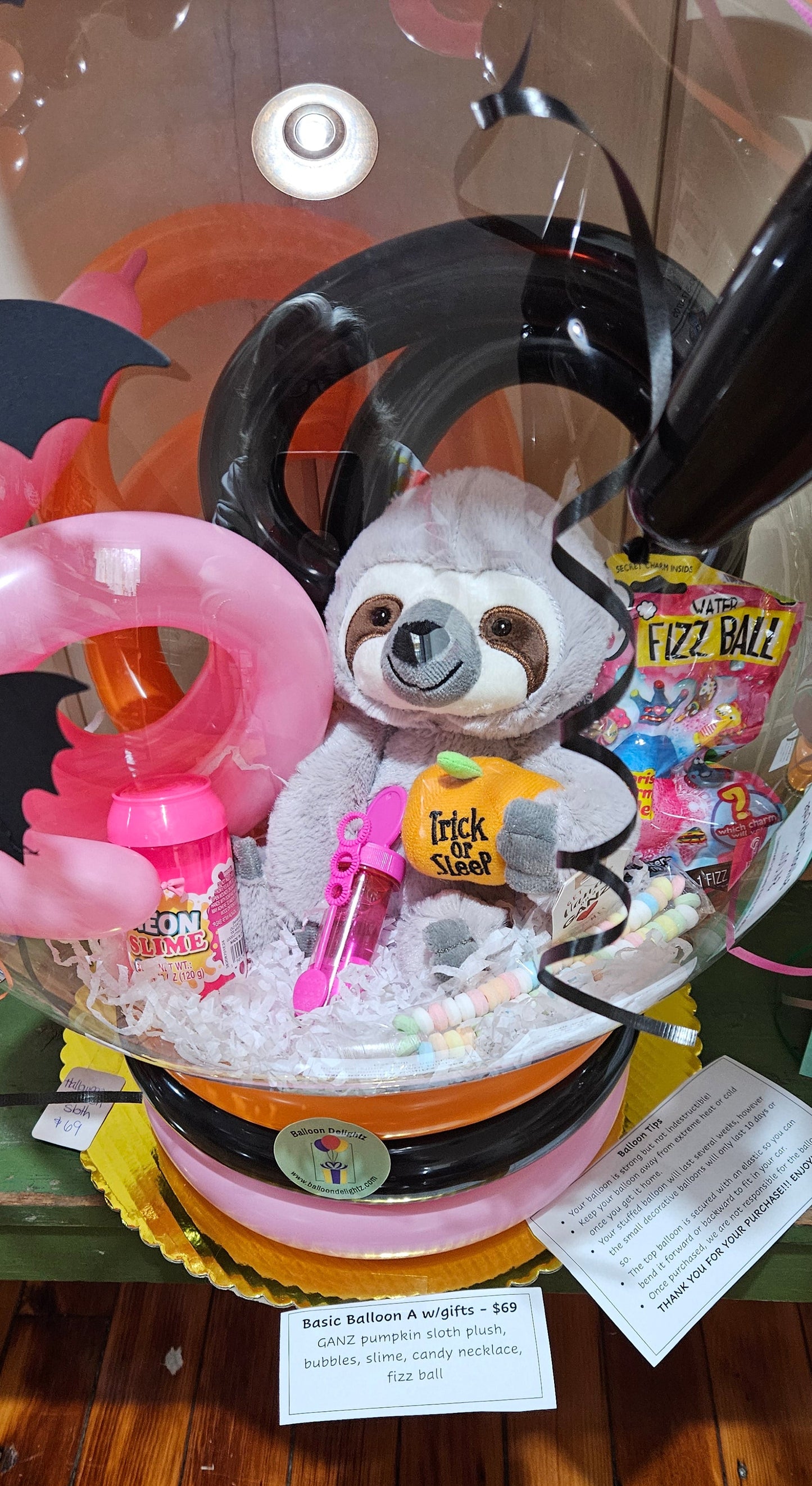 halloween sloth plush in a stuffed balloon