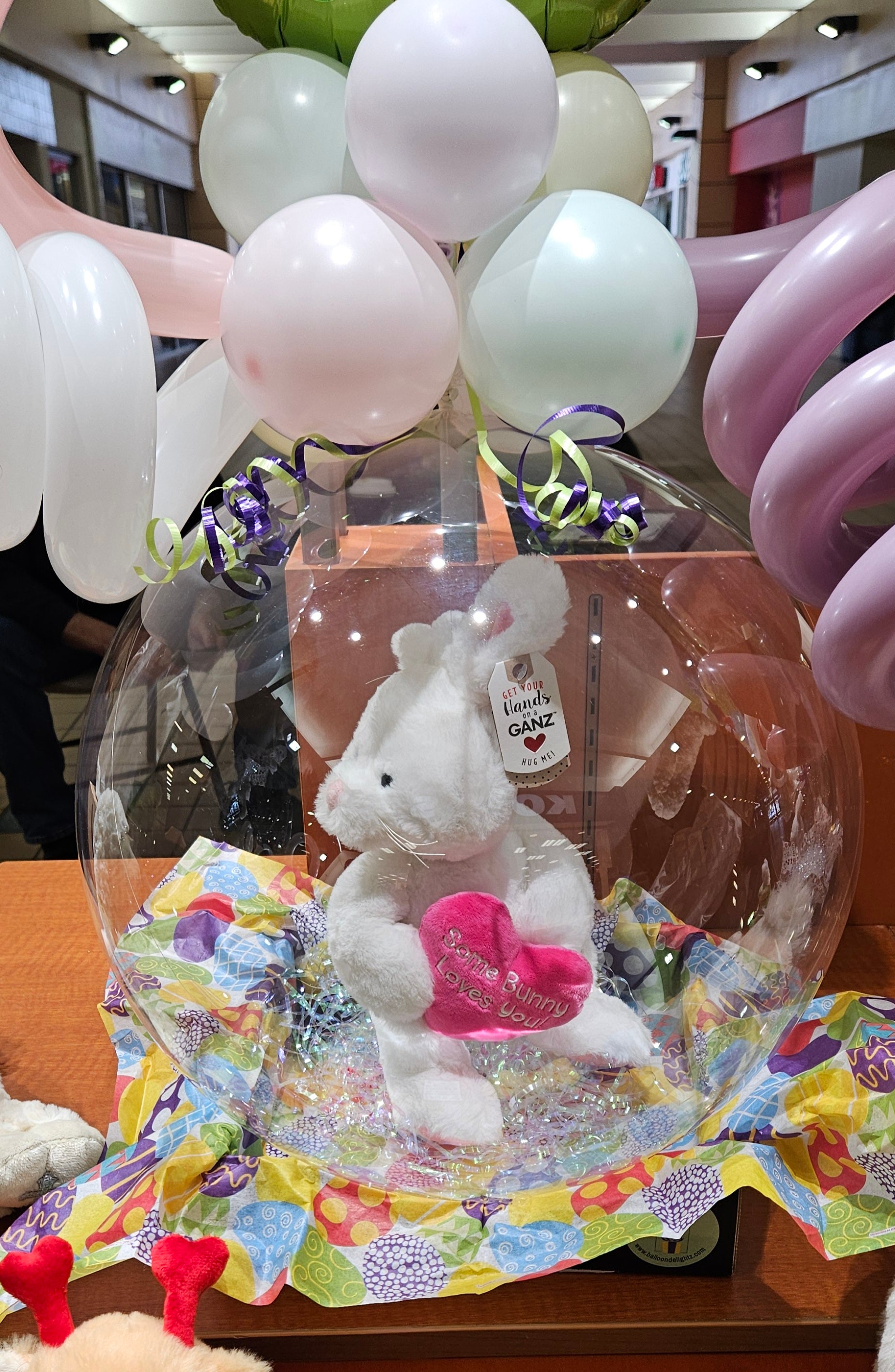bunny plush toy in a stuffed balloon