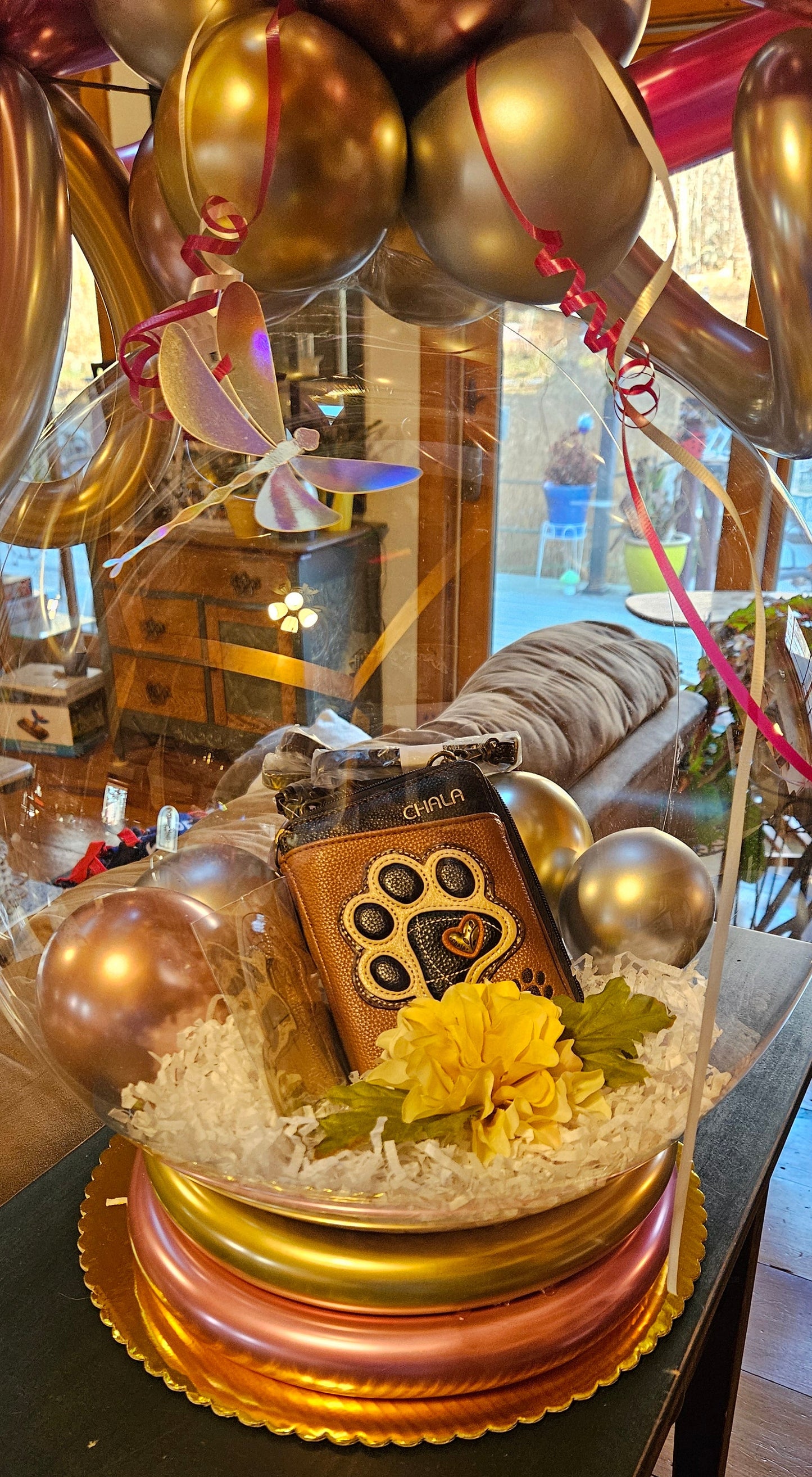 chala paw print handbag in a stuffed balloon
