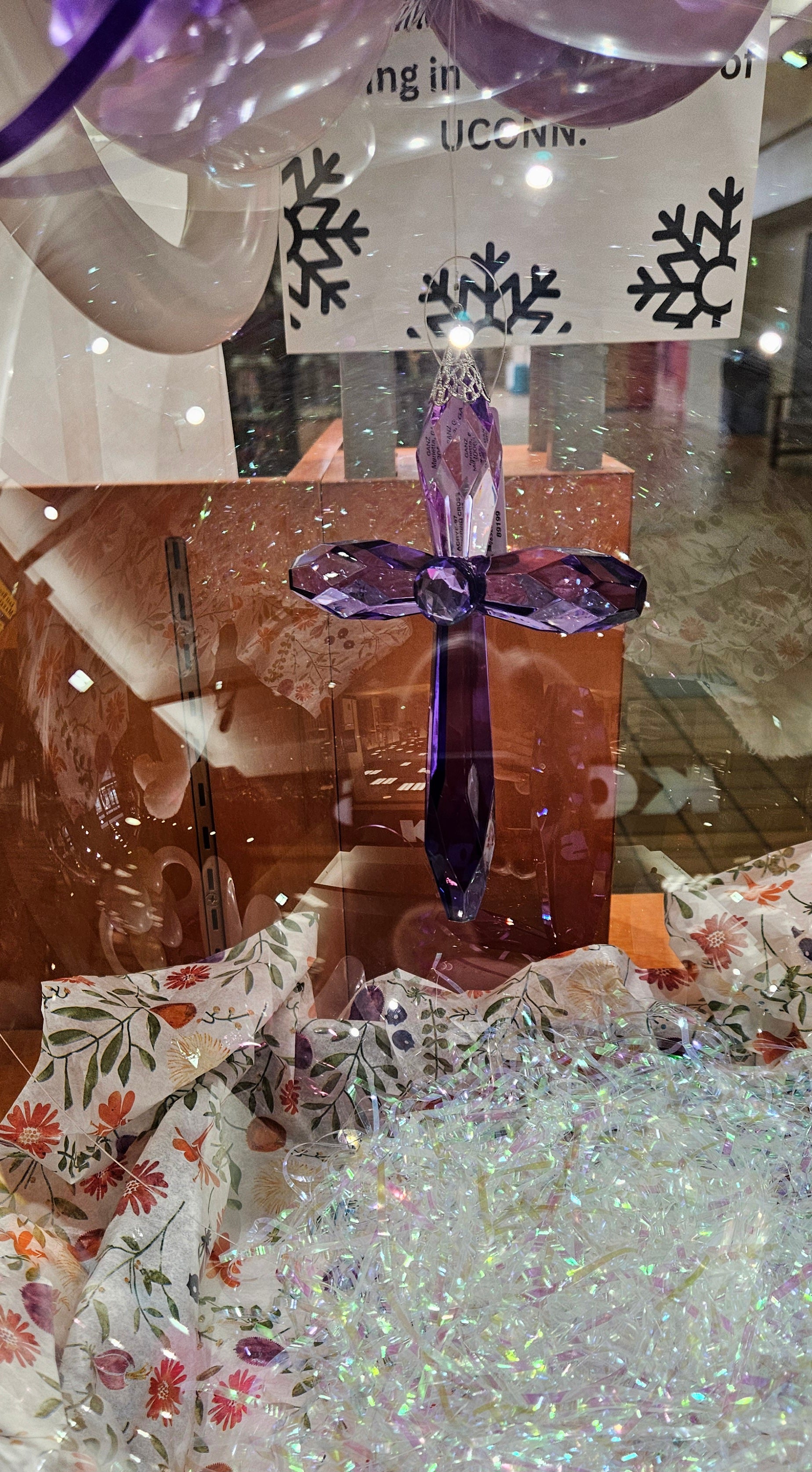 divine cross suncatcher in a stuffed balloon closeup