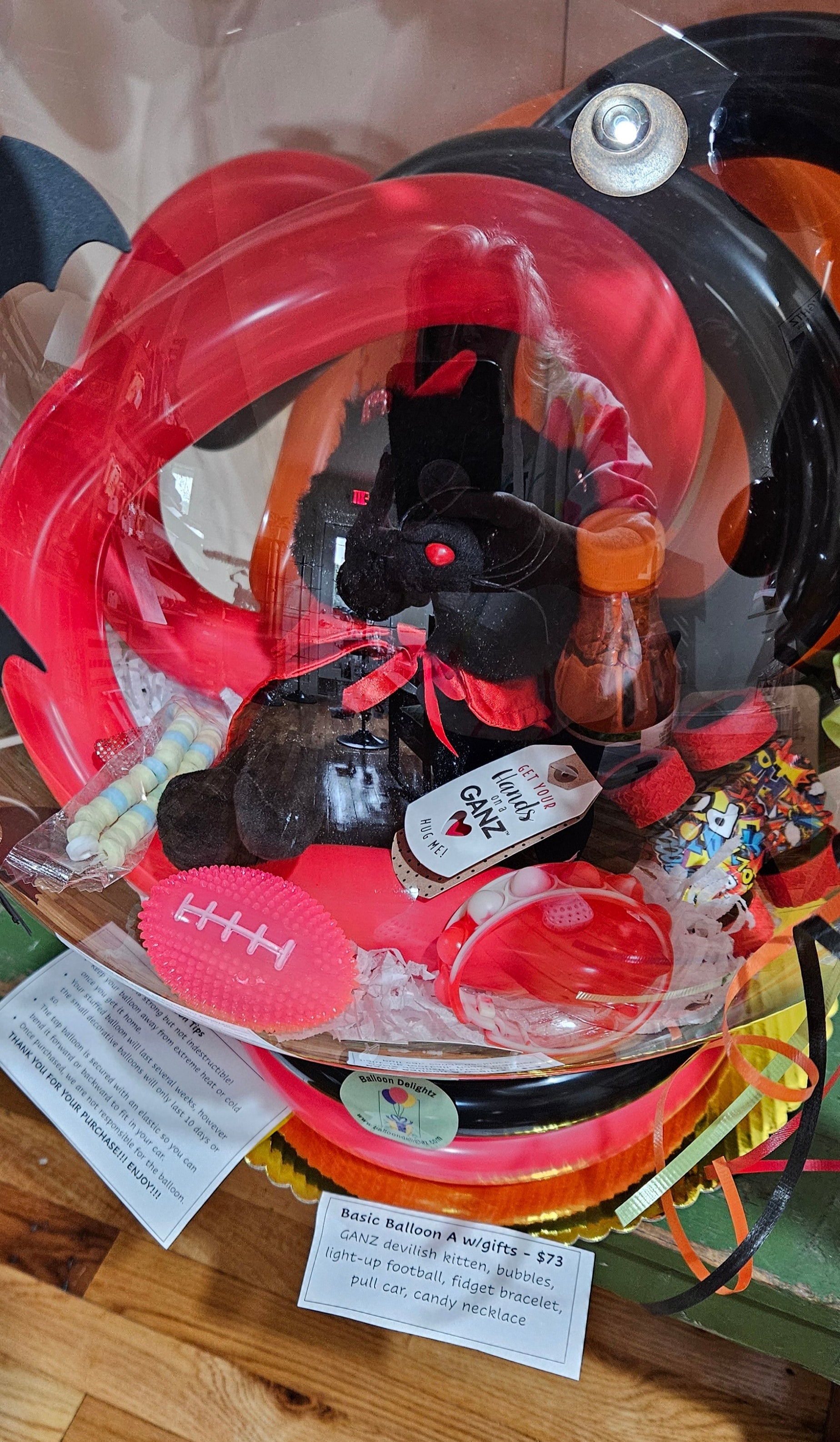 halloween kitty plush in a stuffed balloon